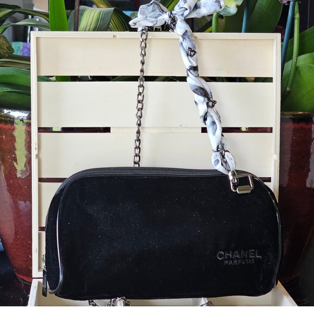 CHANEL Black Clutch with Silver Chain